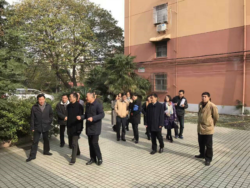 上海市民政局基层政权和社区建设处处长章淑萍,徐汇区民政局局长施涛